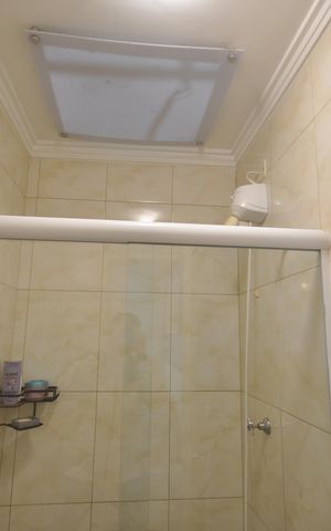 Casa de condomínio à venda com 60m², 2 quartos e 2 vagasBanheiro da Suíte 1