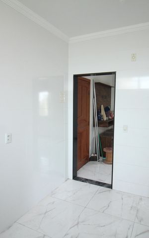 Apartamento à venda com 54m², 2 quartos e 1 vagaCozinha e Área de Serviço