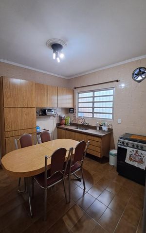 Casa à venda com 105m², 3 quartos e 1 vaga Casa à venda com 105m², 3 quartos e 1 vagaCozinha