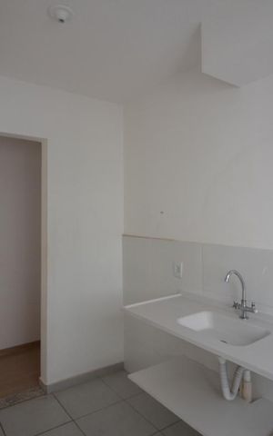 Apartamento à venda com 48m², 2 quartos e 1 vaga Apartamento à venda com 48m², 2 quartos e 1 vagaCozinha e Área de Serviço