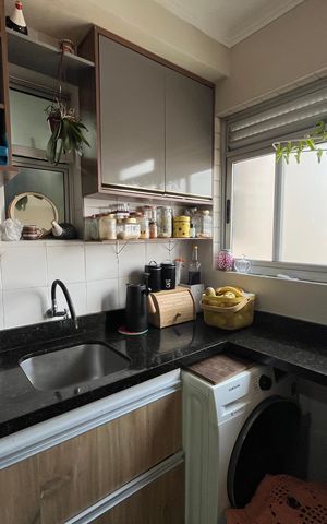 Apartamento à venda com 65m², 2 quartos e 1 vaga Apartamento à venda com 65m², 2 quartos e 1 vagaCozinha e Área de Serviço