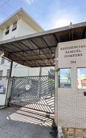 Apartamento à venda com 65m², 2 quartos e 1 vagaFachada + plaquinha