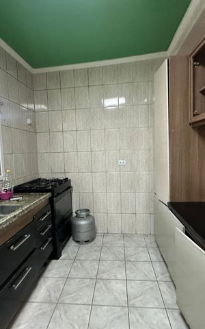 Casa à venda com 137m², 2 quartos e 2 vagas Casa à venda com 137m², 2 quartos e 2 vagasCozinha