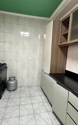 Casa à venda com 137m², 2 quartos e 2 vagas Casa à venda com 137m², 2 quartos e 2 vagasCozinha