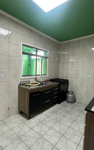 Casa à venda com 137m², 2 quartos e 2 vagas Casa à venda com 137m², 2 quartos e 2 vagasCozinha