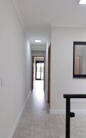Casa à venda com 130m², 3 quartos e 2 vagasCorredor