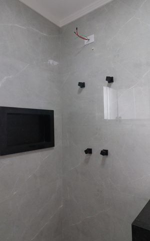 Casa à venda com 130m², 3 quartos e 2 vagasBanheiro da Suíte 1
