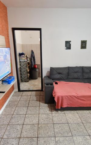 Casa à venda com 100m², 2 quartos e 2 vagasSala