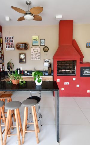 Casa de condomínio à venda com 336m², 4 quartos e 2 vagasVaranda gourmet
