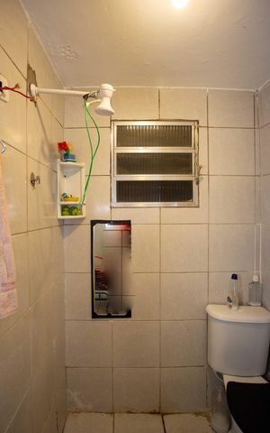 Casa à venda com 100m², 3 quartos e 2 vagasBanheiro 2