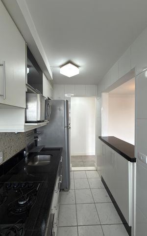 Apartamento para alugar com 69m², 2 quartos e 2 vagas Apartamento para alugar com 69m², 2 quartos e 2 vagasCozinha e Área de Serviço
