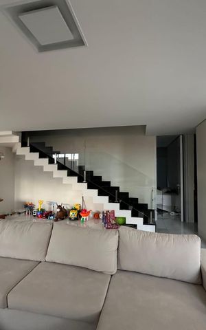 Casa de condomínio à venda com 394m², 4 quartos e 4 vagasSala