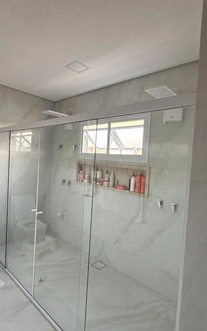 Casa de condomínio à venda com 394m², 4 quartos e 4 vagasBanheiro 4