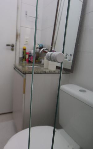 Casa de condomínio à venda com 60m², 2 quartos e 1 vagaBanheiro da Suíte