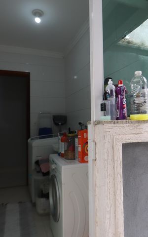 Casa de condomínio à venda com 60m², 2 quartos e 1 vagaLavanderia