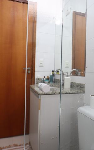 Casa de condomínio à venda com 60m², 2 quartos e 1 vagaBanheiro Social