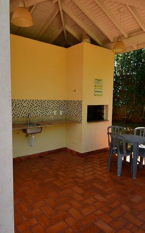 Casa de condomínio à venda com 220m², 3 quartos e 4 vagasÁrea comum - Churrasqueira