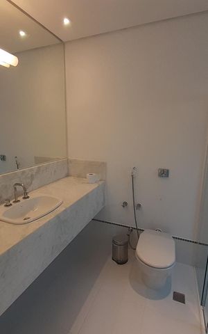 Casa de condomínio à venda com 410m², 4 quartos e 4 vagasBanheiro