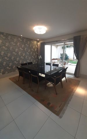 Casa de condomínio à venda com 410m², 4 quartos e 4 vagasSala