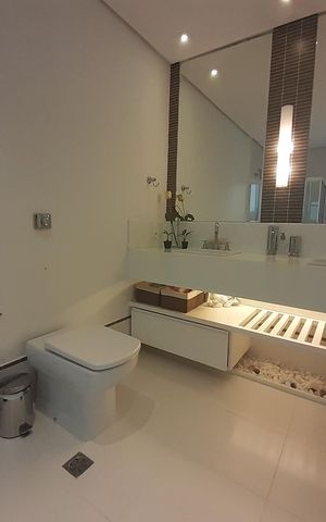 Casa de condomínio à venda com 410m², 4 quartos e 4 vagasBanheiro