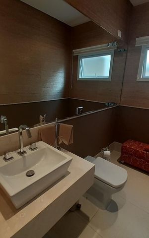 Casa de condomínio à venda com 410m², 4 quartos e 4 vagasBanheiro