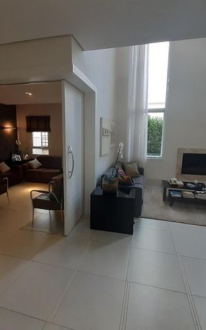 Casa de condomínio à venda com 410m², 4 quartos e 4 vagasSala