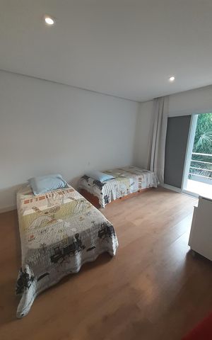 Casa de condomínio à venda com 410m², 4 quartos e 4 vagasQuarto
