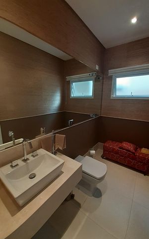 Casa de condomínio à venda com 410m², 4 quartos e 4 vagasBanheiro