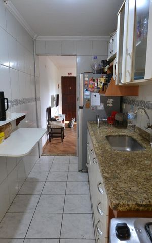 Apartamento à venda com 52m², 2 quartos e 1 vagaCozinha e Área de Serviço