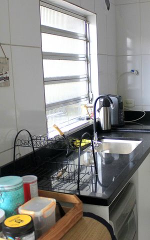 Apartamento à venda com 77m², 2 quartos e 1 vagaCozinha e lavanderia 
