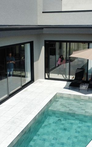 Casa de condomínio à venda com 228m², 3 quartos e 3 vagasÁrea externa