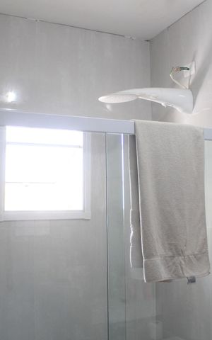 Casa à venda com 150m², 3 quartos e 3 vagasBanheiro da Suíte 1