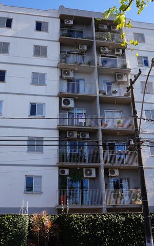 Apartamento à venda com 111m², 3 quartos e 2 vagasFachada e plaquinha PXZV-862