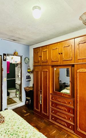 Casa à venda com 59m², 3 quartos e 2 vagas Casa à venda com 59m², 3 quartos e 2 vagasSuite 1