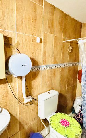 Casa à venda com 59m², 3 quartos e 2 vagas Casa à venda com 59m², 3 quartos e 2 vagasBanheiro 1