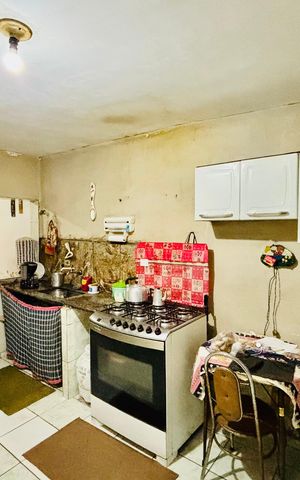 Casa à venda com 59m², 3 quartos e 2 vagas Casa à venda com 59m², 3 quartos e 2 vagasCozinha