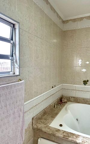 Casa à venda com 300m², 3 quartos e 7 vagas Casa à venda com 300m², 3 quartos e 7 vagasBanheiro da Suíte