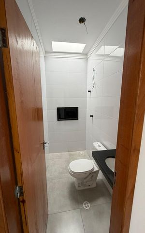 Casa à venda com 100m², 3 quartos e 2 vagas Casa à venda com 100m², 3 quartos e 2 vagasBanheiro 2