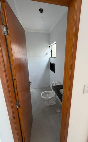 Casa à venda com 100m², 3 quartos e 2 vagas Casa à venda com 100m², 3 quartos e 2 vagasBanheiro 1