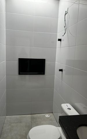 Casa à venda com 100m², 3 quartos e 2 vagas Casa à venda com 100m², 3 quartos e 2 vagasBanheiro 2