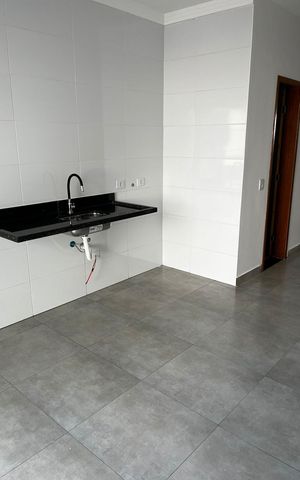 Casa à venda com 100m², 3 quartos e 2 vagas Casa à venda com 100m², 3 quartos e 2 vagasCozinha