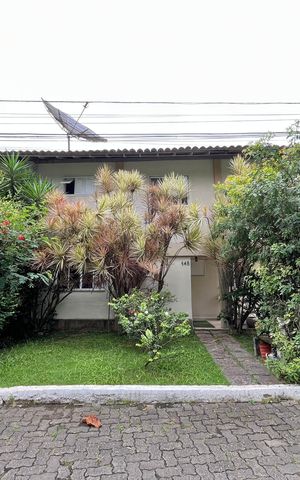 Casa de condomínio à venda com 190m², 3 quartos e 4 vagas Casa de condomínio à venda com 190m², 3 quartos e 4 vagasFachada