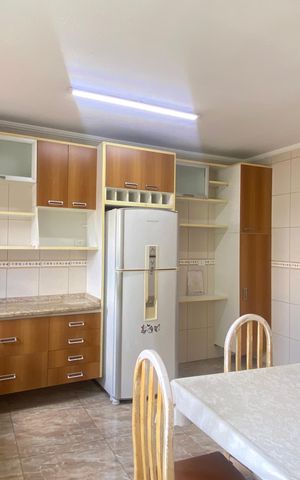 Casa à venda com 300m², 4 quartos e 5 vagas Casa à venda com 300m², 4 quartos e 5 vagasCozinha