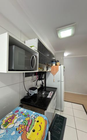 Apartamento à venda com 50m², 2 quartos e 1 vaga Apartamento à venda com 50m², 2 quartos e 1 vagaCozinha e Área de Serviço