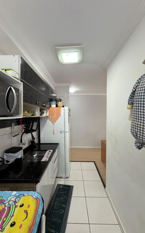 Apartamento à venda com 50m², 2 quartos e 1 vaga Apartamento à venda com 50m², 2 quartos e 1 vagaCozinha e Área de Serviço