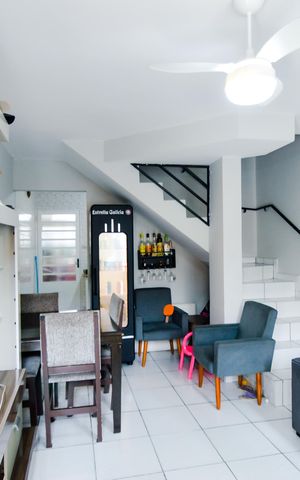 Casa de condomínio à venda com 119m², 2 quartos e 2 vagasSala