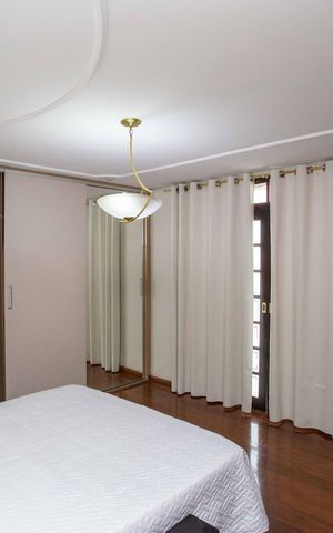 Casa à venda com 224m², 4 quartos e 5 vagasQuarto Suite 1 Casa 1