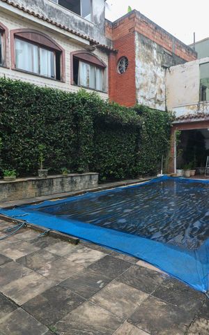 Casa à venda com 600m², 5 quartos e 3 vagas Casa à venda com 600m², 5 quartos e 3 vagasÁrea externa