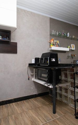 Casa à venda com 70m², 3 quartos e 2 vagas Casa à venda com 70m², 3 quartos e 2 vagasCozinha
