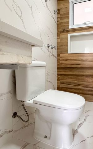 Apartamento à venda com 73m², 2 quartos e 2 vagas Apartamento à venda com 73m², 2 quartos e 2 vagasBanheiro da Suíte 1